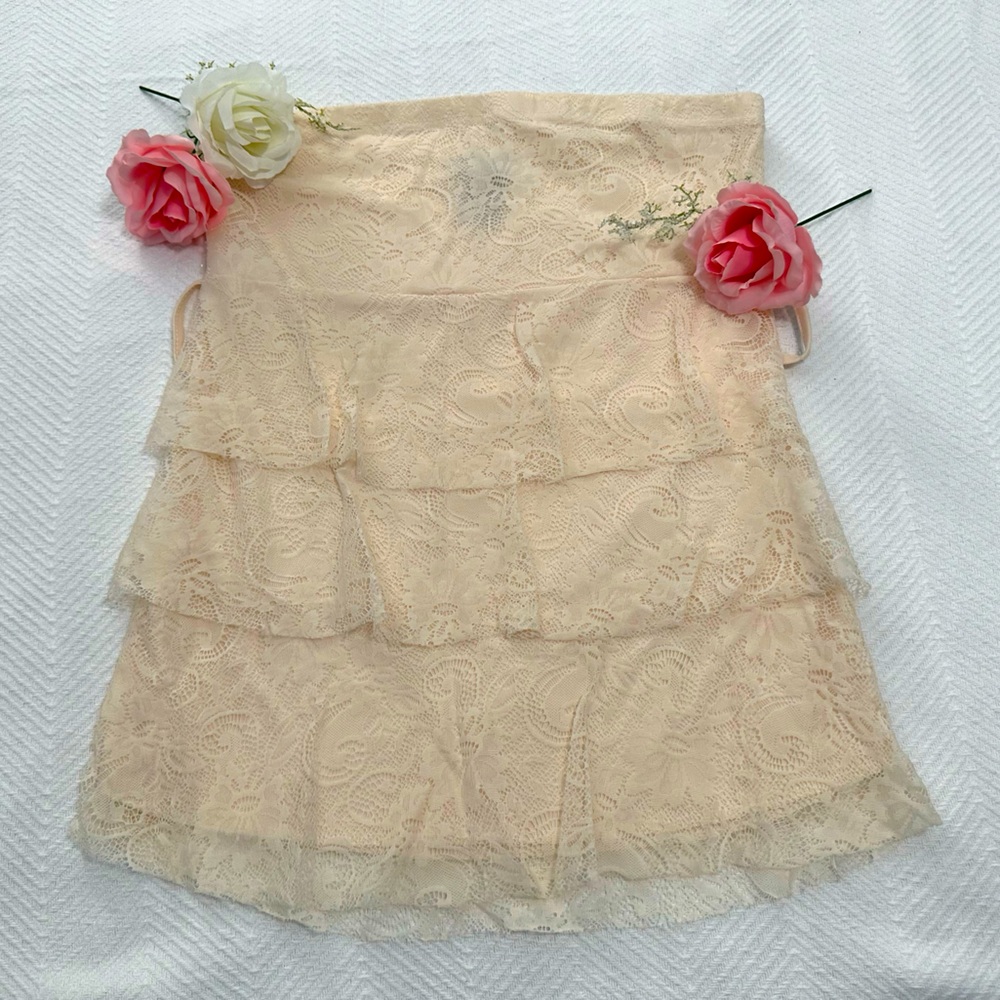 RUE21 woman blouse size M with three lace layers.